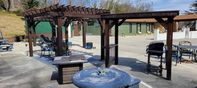 view of patio / terrace featuring outdoor dining area and a pergola