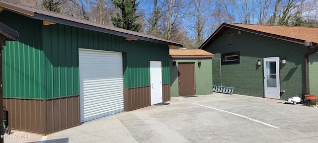 view of side of home featuring brick siding