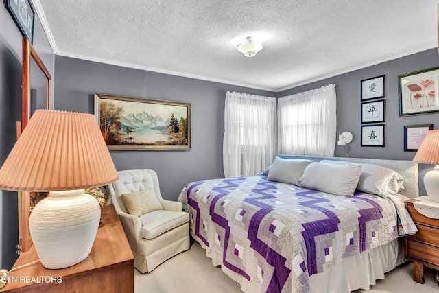 bedroom with a textured ceiling and crown molding