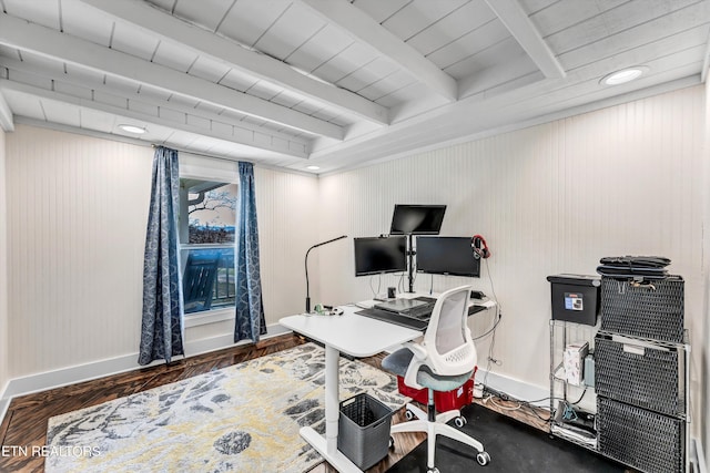 office area featuring beam ceiling, baseboards, and wood finished floors