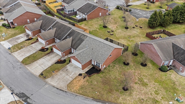 birds eye view of property with a residential view