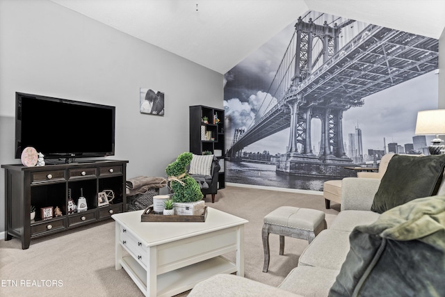 carpeted living room featuring lofted ceiling and a water view