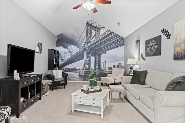 living room with carpet flooring, a view of city, a ceiling fan, and vaulted ceiling