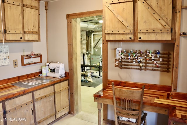 interior space featuring light tile patterned flooring