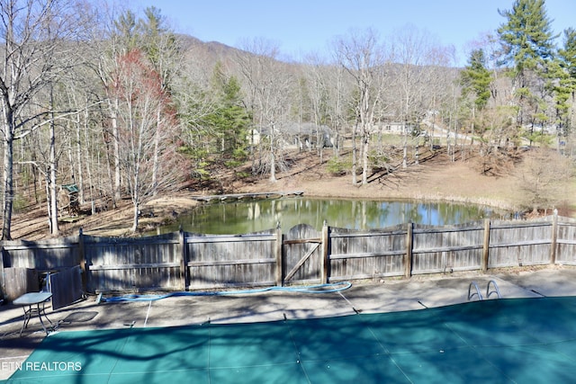 view of pool with fence