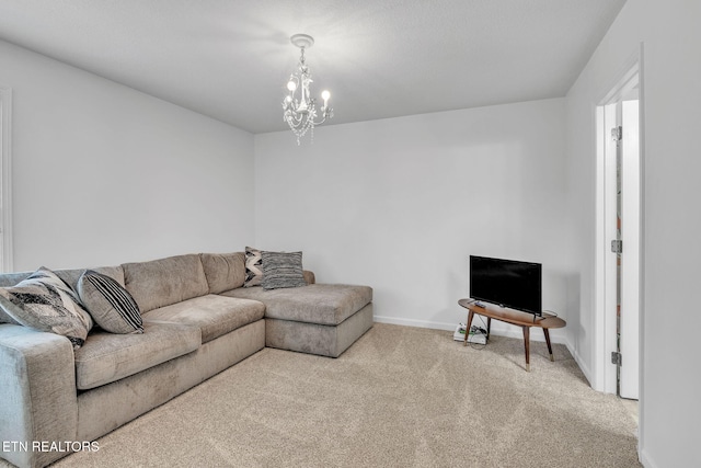 living area with a notable chandelier, baseboards, and carpet floors