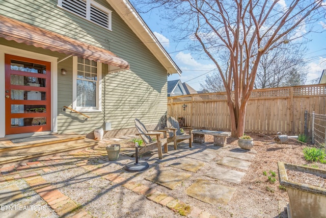 view of patio / terrace featuring fence private yard