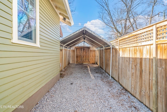 view of yard featuring a gate and fence