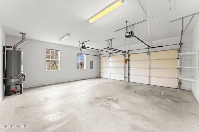 garage featuring electric panel, a garage door opener, and water heater