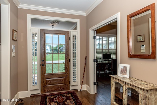 entrance foyer with crown molding, dark wood-type flooring, and baseboards