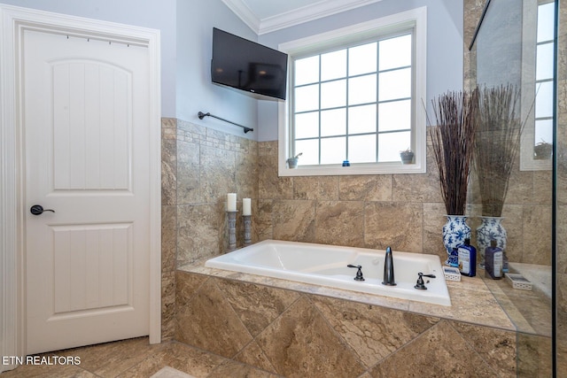 full bathroom with ornamental molding and a bath