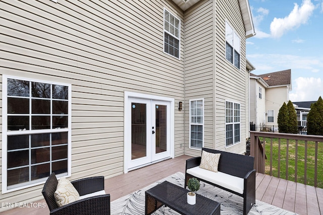 wooden deck featuring french doors and an outdoor hangout area