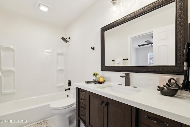 full bathroom with vanity, shower / tub combination, and toilet