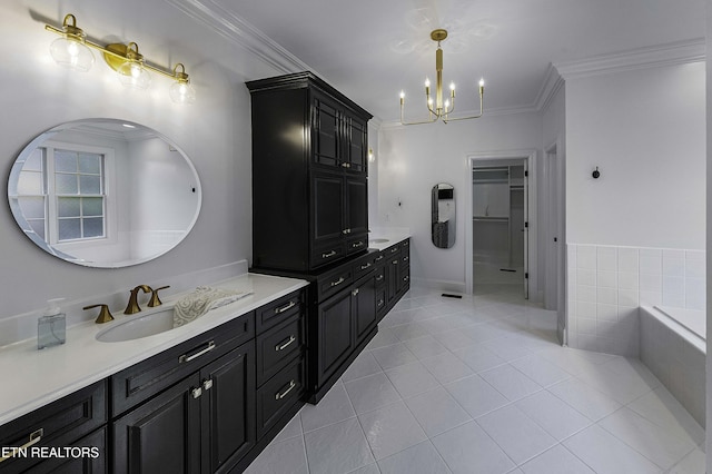 bathroom with tile patterned flooring, a tub, vanity, and ornamental molding