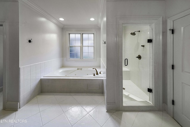 full bath featuring tile patterned floors, a jetted tub, a stall shower, and ornamental molding