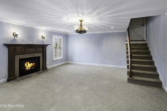 unfurnished living room featuring baseboards, a fireplace with flush hearth, ornamental molding, stairs, and carpet flooring