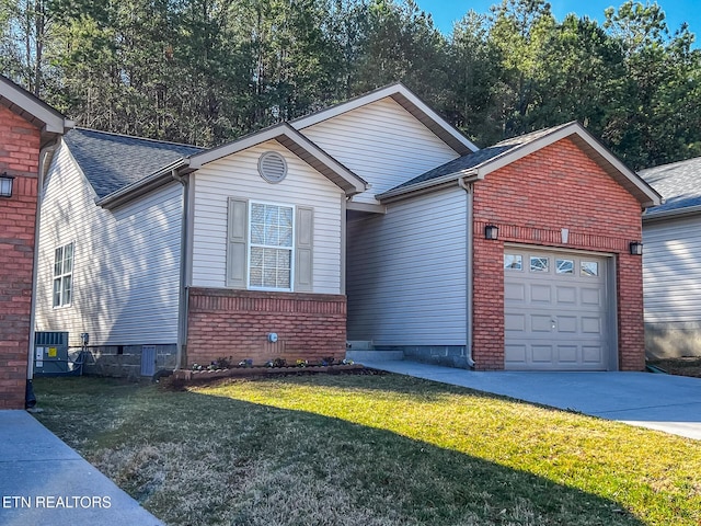 view of property exterior with brick siding, central air condition unit, concrete driveway, a lawn, and a garage