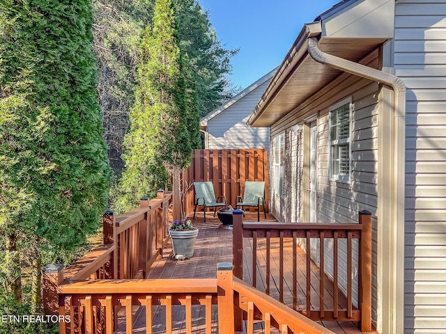 wooden terrace with fence