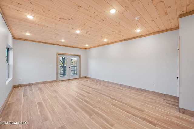 spare room featuring light wood finished floors, recessed lighting, wood ceiling, and crown molding