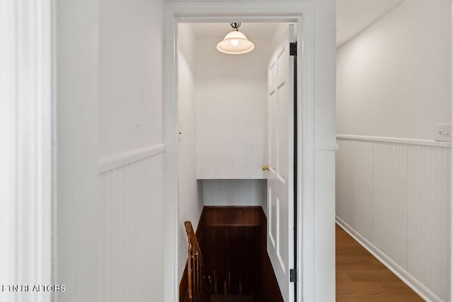 interior space with wainscoting and wood finished floors