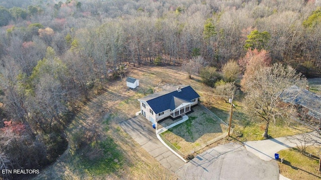 drone / aerial view with a forest view