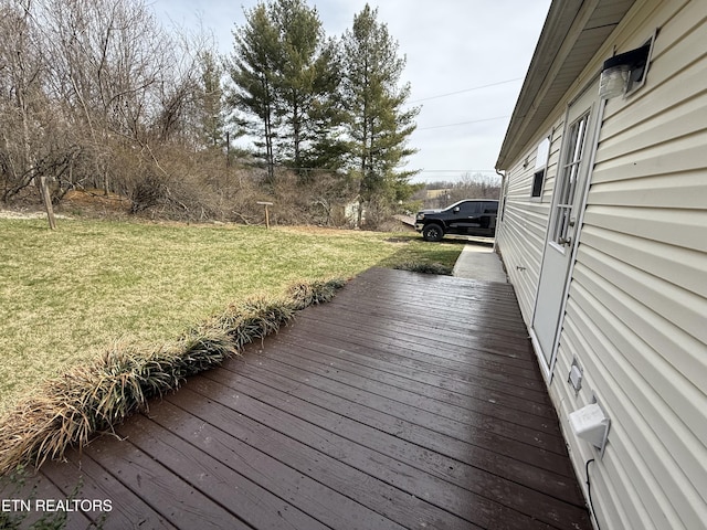 deck featuring a yard