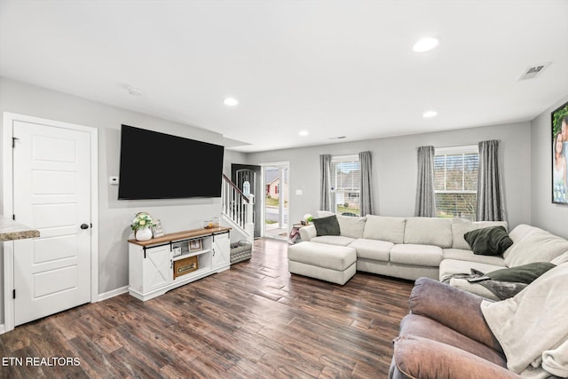 living room with dark wood finished floors, stairs, recessed lighting, and visible vents