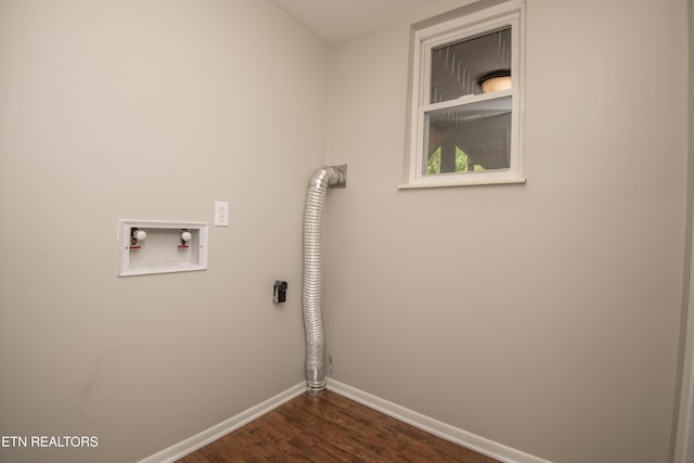 washroom with laundry area, dark wood-style flooring, electric dryer hookup, washer hookup, and baseboards