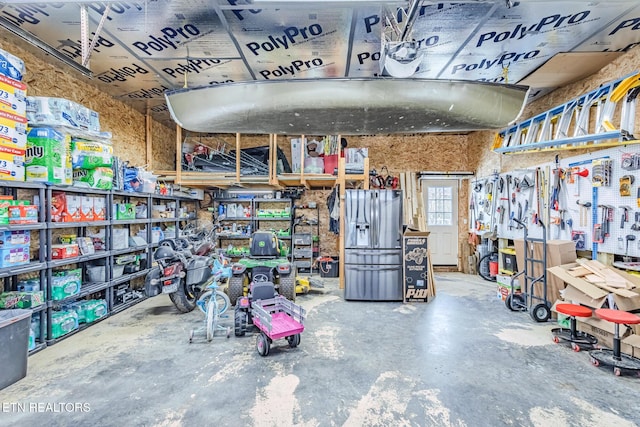 garage with a workshop area