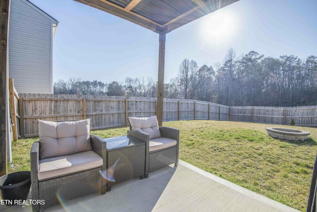 view of patio with an outdoor hangout area and a fenced backyard