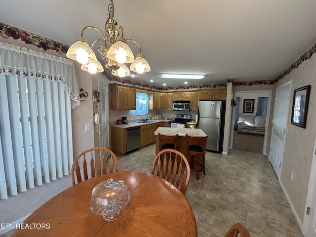 dining area featuring baseboards