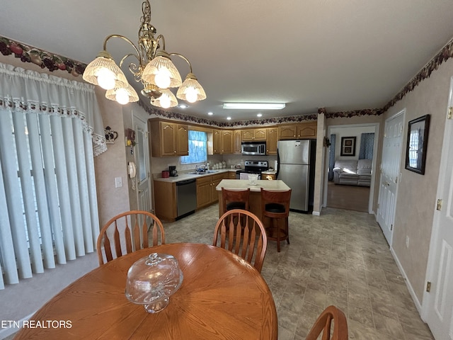 dining area featuring baseboards