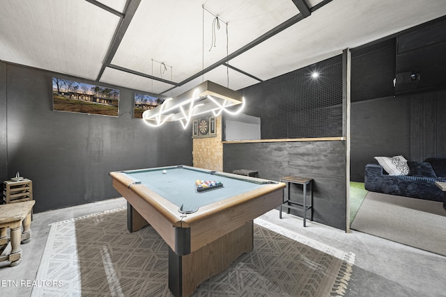 playroom featuring concrete flooring and billiards