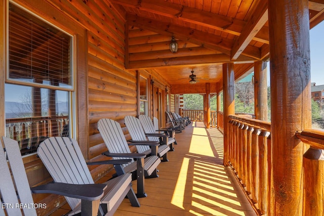 wooden deck featuring covered porch