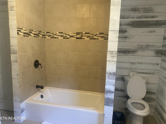 full bath featuring tub / shower combination and toilet