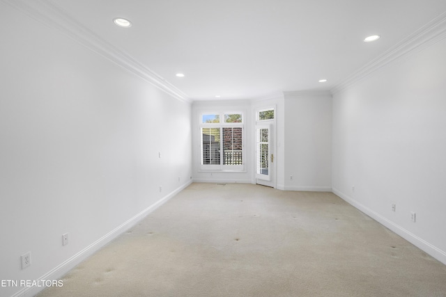 unfurnished room with light carpet, recessed lighting, baseboards, and crown molding