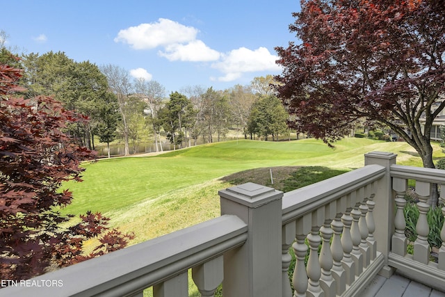 view of yard featuring a balcony