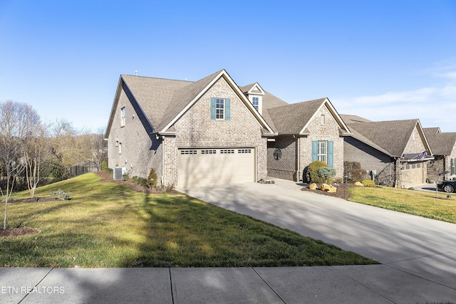 view of front of home featuring brick siding, concrete driveway, central AC, a front yard, and an attached garage