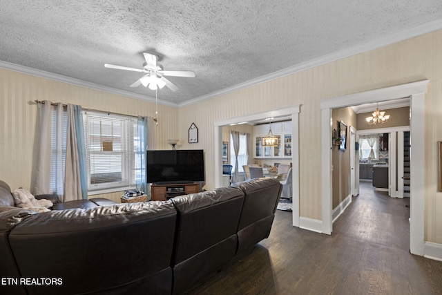 living area featuring dark wood-style floors, plenty of natural light, and crown molding