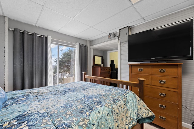 bedroom featuring a paneled ceiling