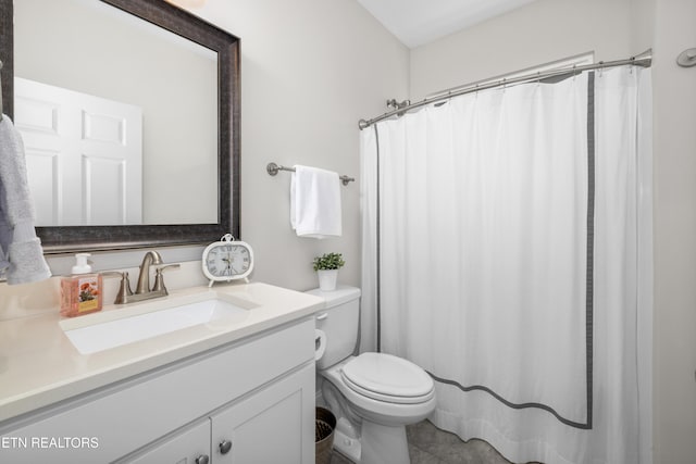 full bath with vanity, a shower with shower curtain, toilet, and tile patterned floors