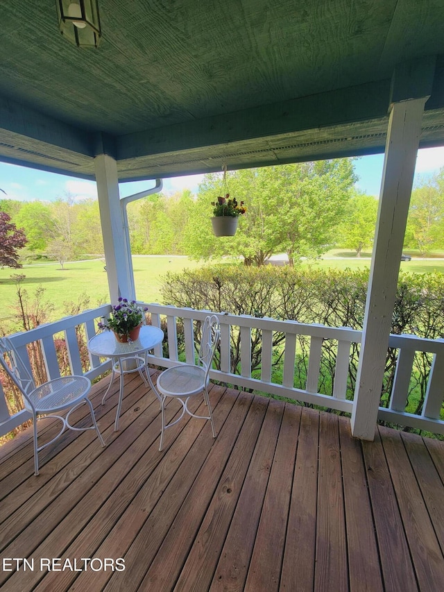 deck with covered porch