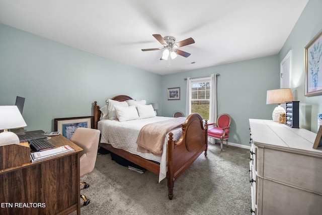 carpeted bedroom with baseboards and a ceiling fan