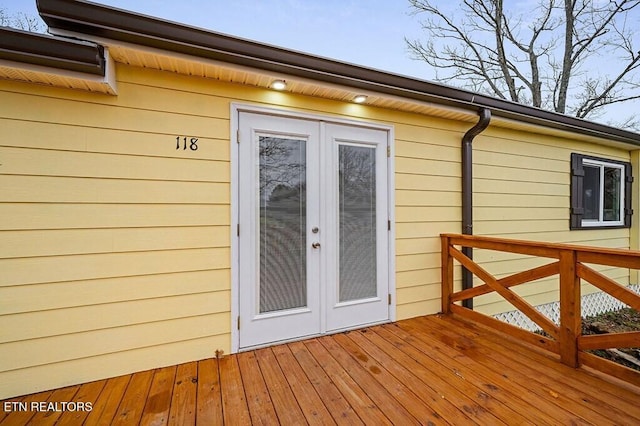 wooden terrace featuring french doors