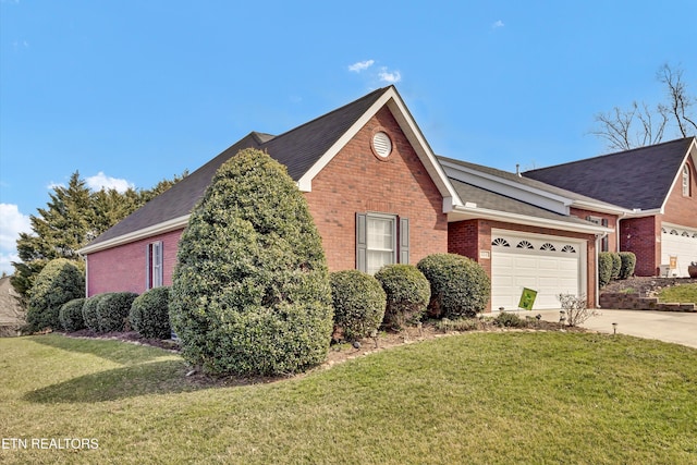 view of front of property featuring brick siding, an attached garage, concrete driveway, and a front yard