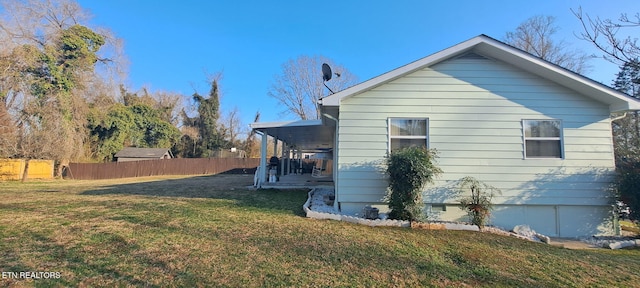 107 W Pawley Rd, Oak Ridge, TN 37830 - view of side of home featuring a lawn and fence