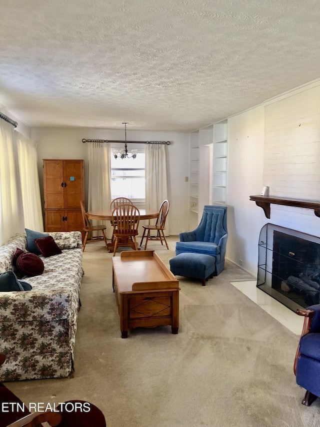107 W Pawley Rd, Oak Ridge, TN 37830 - carpeted living area with a fireplace with flush hearth, a textured ceiling, a notable chandelier, and built in shelves