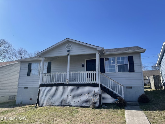 view of front facade with crawl space and a porch