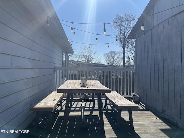 deck with outdoor dining space