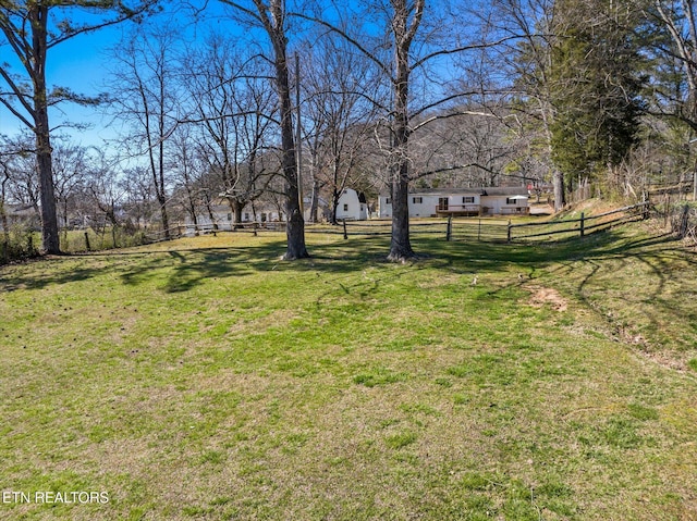 view of yard featuring fence